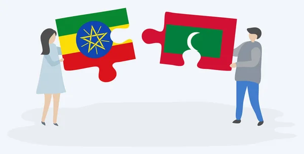 Çift Etiyopya Maldiv Bayrakları Ile Iki Bulmaca Parçaları Tutan Etiyopya — Stok Vektör