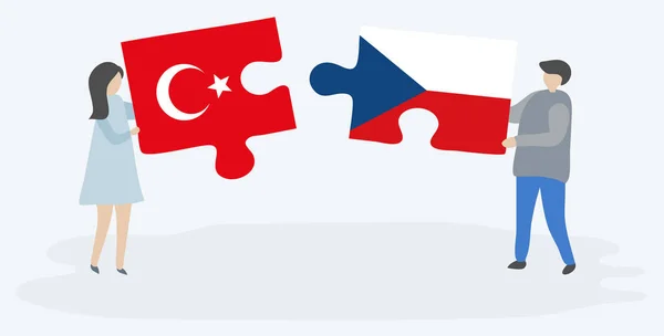 一对夫妇拿着两个拼图片与土耳其和捷克国旗 土耳其和捷克共和国国家符号在一起 — 图库矢量图片