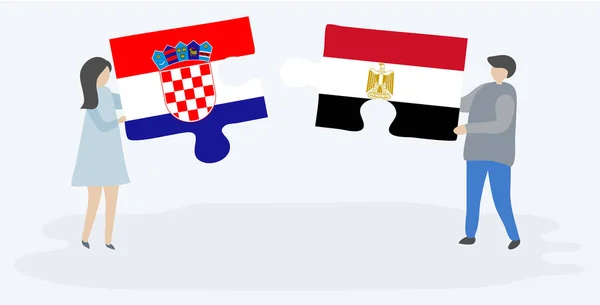 Pareja Sosteniendo Dos Piezas Rompecabezas Con Banderas Croatas Egipcias Croacia — Archivo Imágenes Vectoriales