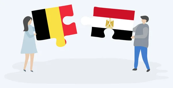 Ζευγάρι Που Κρατά Δύο Κομμάτια Παζλ Βελγικές Και Αιγυπτιακές Σημαίες — Διανυσματικό Αρχείο
