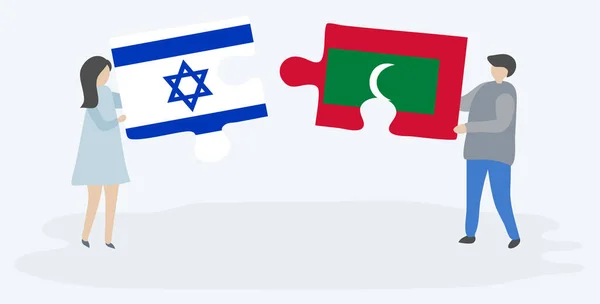 Dvojice Drží Dvě Skládanky Izraelskými Maldivijské Vlajky Národní Symboly Izraele — Stockový vektor