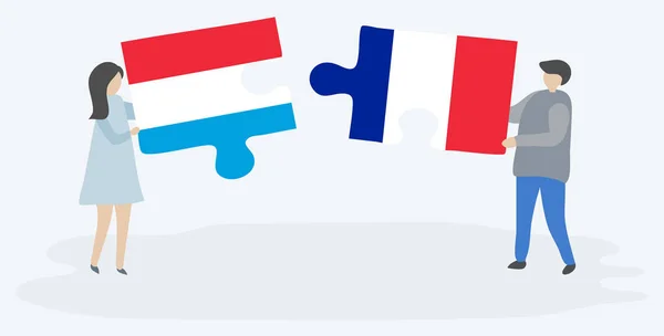 Ζευγάρι Που Κρατά Δύο Κομμάτια Παζλ Λουξεμβουργιανά Και Γαλλικές Σημαίες — Διανυσματικό Αρχείο