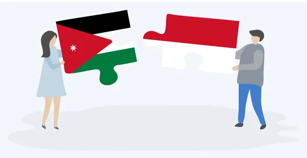 ヨルダンとモネガスクの旗を持つ2つのパズルピースを保持しているカップル ヨルダンとモナコの国のシンボルが一緒に — ストックベクタ