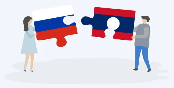 Pareja Sosteniendo Dos Piezas Rompecabezas Con Banderas Rusia Laos Rusia — Archivo Imágenes Vectoriales