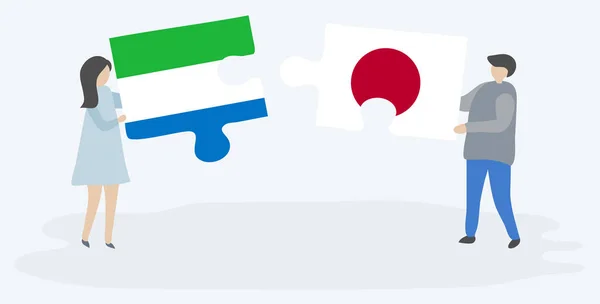 Pareja Sosteniendo Dos Piezas Rompecabezas Con Banderas Sierra Leona Japón — Archivo Imágenes Vectoriales