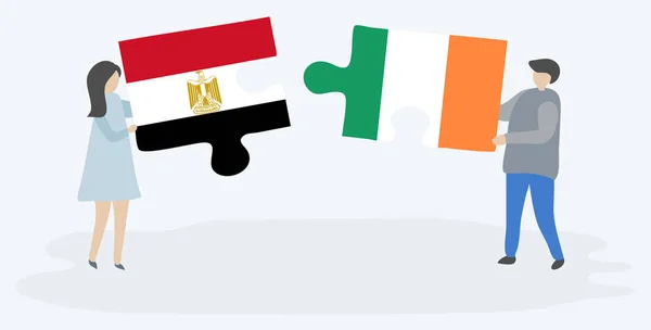 Pareja Sosteniendo Dos Piezas Rompecabezas Con Banderas Egipcias Irlandesas Egipto — Vector de stock