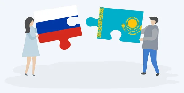 Couple Holding Two Puzzles Pieces Russian Kazakh Flags Russia Kazakhstan — Stock Vector