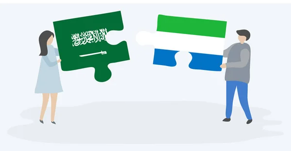 一对夫妇拿着两块拼图 上面挂着沙特阿拉伯和塞拉利昂国旗 沙特阿拉伯和塞拉利昂国家符号在一起 — 图库矢量图片