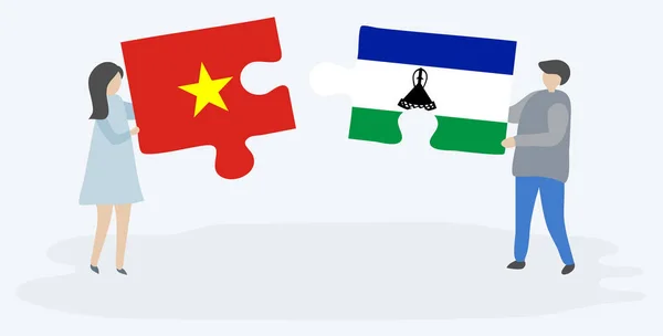 Couple Holding Two Puzzles Pieces Vietnamese Basotho Flags Vietnam Lesotho — Stock Vector