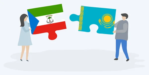 Pareja Sosteniendo Dos Piezas Rompecabezas Con Banderas Guinea Ecuatorial Kazajstán — Vector de stock