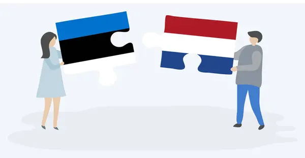 Paar Houden Twee Puzzels Stukken Met Estse Nederlandse Vlaggen Estland — Stockvector