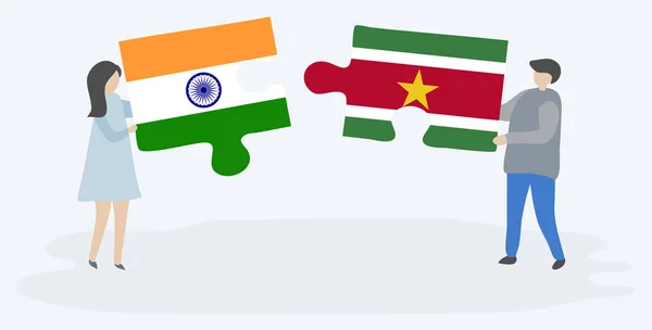 Пара Держащая Две Головоломки Индийскими Суринамскими Флагами Индия Суринам Вместе — стоковый вектор