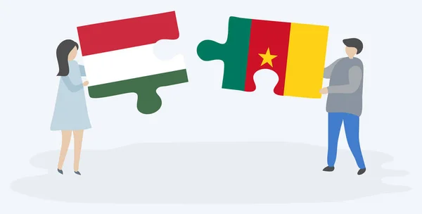 Cuplu Care Deține Două Piese Puzzle Uri Steaguri Maghiare Cameruneze — Vector de stoc