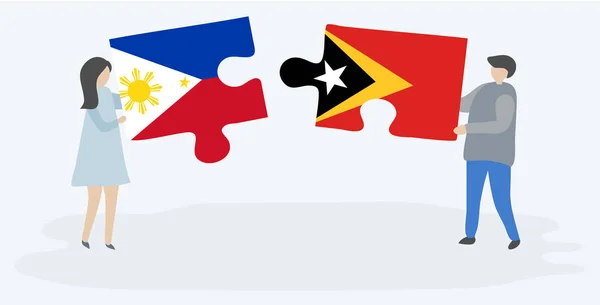 Par Som Innehar Två Pusselbitar Med Filippinska Och Timorese Flaggor — Stock vektor