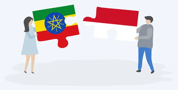 一对夫妇拿着两块拼图 上面挂着埃塞俄比亚和印度尼西亚国旗 埃塞俄比亚和印度尼西亚国家符号在一起 — 图库矢量图片