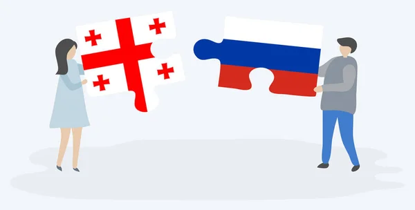 Paar Houden Twee Puzzels Stukken Met Georgische Russische Vlaggen Georgië — Stockvector