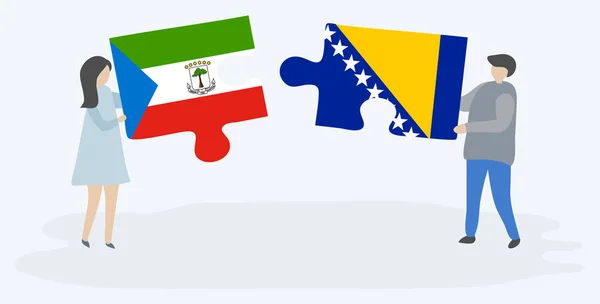 Couple Tenant Deux Pièces Puzzles Avec Des Drapeaux Équatoriaux Guinéen — Image vectorielle