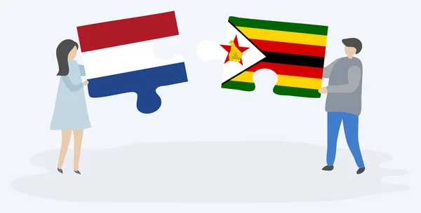 Ζευγάρι Που Κρατά Δυο Κομμάτια Παζλ Σημαίες Ολλανδίας Και Ζιμπάμπουε — Διανυσματικό Αρχείο