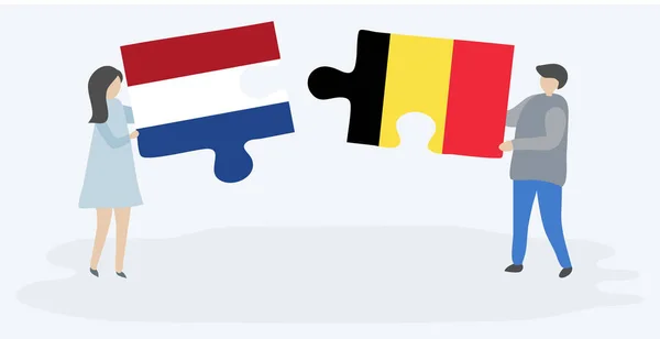 Paar Houden Twee Puzzels Stukken Met Nederlandse Belgische Vlaggen Nederland — Stockvector