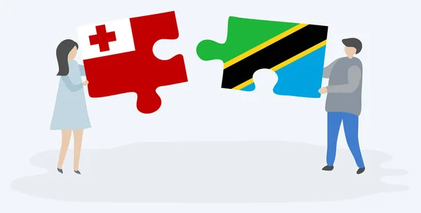 Pareja Sosteniendo Dos Piezas Rompecabezas Con Banderas Tongan Tanzania Tonga — Vector de stock