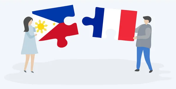 Пара Держащая Две Головоломки Филиппинскими Французскими Флагами Филиппины Национальные Символы — стоковый вектор