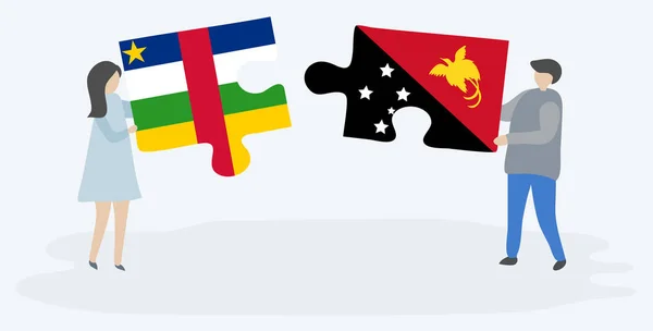 Orta Afrika Papuan Bayrakları Ile Iki Bulmaca Parçaları Tutan Çift — Stok Vektör