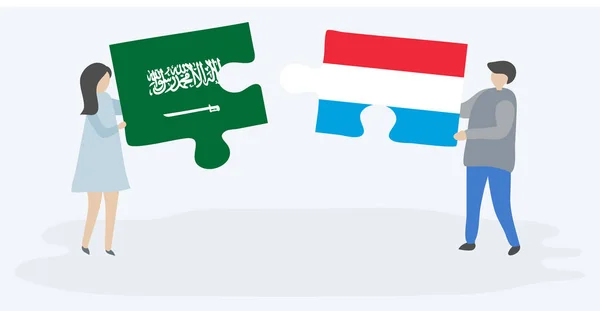Couple Holding Two Puzzles Pieces Saudi Arabian Luxembourgish Flags Saudi — Stock Vector
