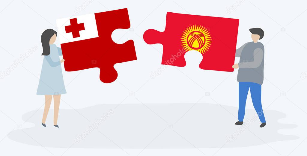 Couple holding two puzzles pieces with Tongan and Kirgiz flags. Tonga and Kyrgyzstan national symbols together.