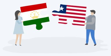 Tacikistani ve Liberya bayrakları ile iki bulmaca parçaları tutan çift. Tacikistan ve Liberya ulusal sembolleri birlikte.
