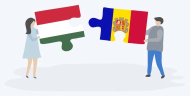 Macar ve Andorran bayrakları ile iki bulmaca parçaları tutan çift. Macaristan ve Andorra ulusal sembolleri birlikte.