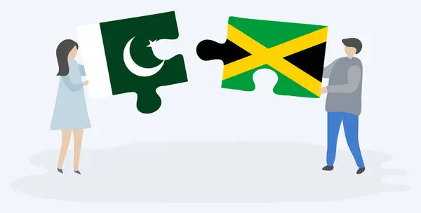 Pakistan Jamaika Bayrakları Ile Iki Bulmaca Parçaları Tutan Çift Pakistan — Stok Vektör