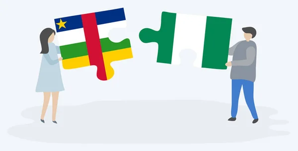 Orta Afrika Nijerya Bayrakları Ile Iki Bulmaca Parçaları Tutan Çift — Stok Vektör