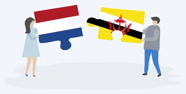 一对夫妇拿着两块拼图 上面挂着荷兰和文莱国旗 荷兰和文莱国家符号在一起 — 图库矢量图片