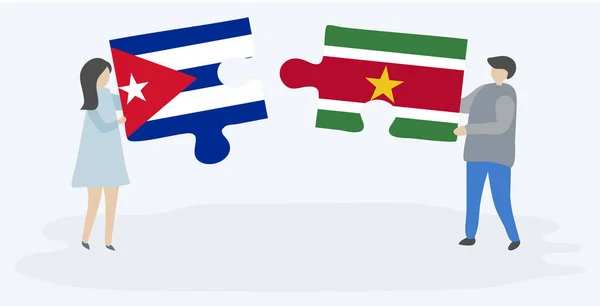 Dvojice Drží Dvě Skládanky Kubánskými Surinamskými Vlajkami Národní Symboly Kuby — Stockový vektor