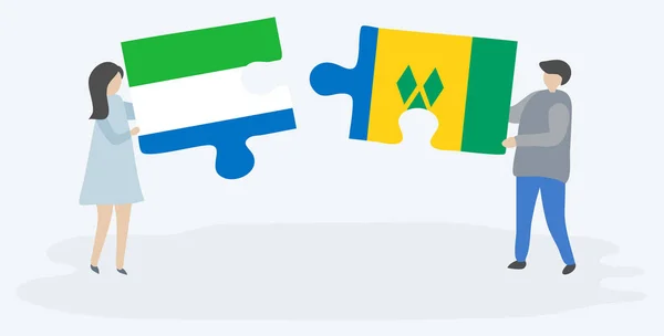 Sierra Leonean Vincentian Bayrakları Ile Iki Bulmaca Parçaları Tutan Çift — Stok Vektör
