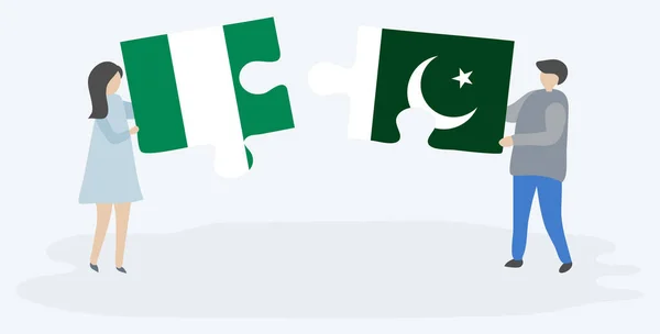 Couple Holding Two Puzzles Pieces Nigerian Pakistani Flags Nigeria Pakistan — Stock Vector