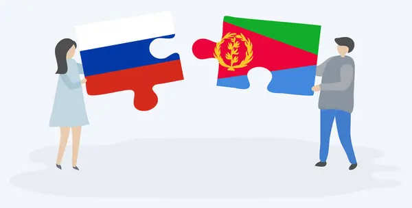 Casal Segurando Duas Peças Quebra Cabeças Com Bandeiras Russas Eritreias — Vetor de Stock