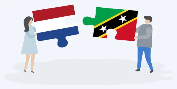 Paar Houden Twee Puzzels Stukken Met Nederlandse Kittitian Vlaggen Nederland — Stockvector