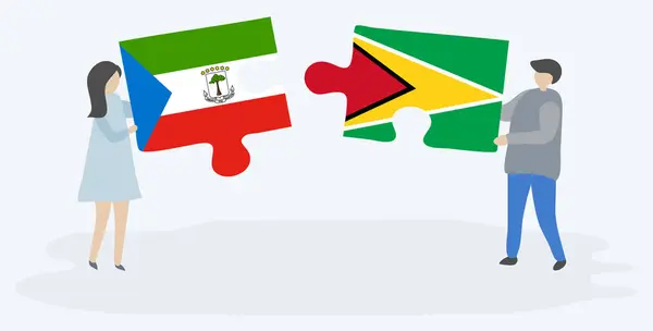 一对夫妇拿着两块拼图 上面挂着赤道几内亚和圭亚那国旗 赤道几内亚和圭亚那国家符号在一起 — 图库矢量图片