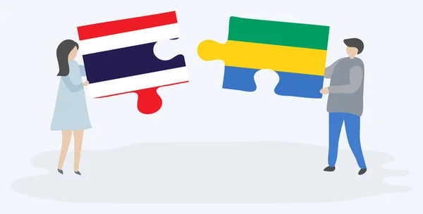 Couple Tenant Deux Pièces Puzzles Avec Des Drapeaux Thaïlandais Gabonais — Image vectorielle