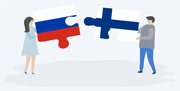 Para Trzyma Dwa Kawałki Puzzli Rosyjskimi Fińskimi Flagami Symbole Narodowe — Wektor stockowy