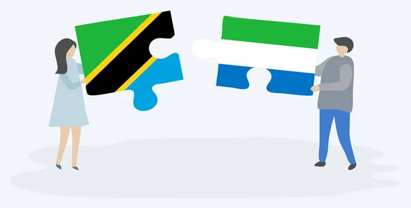 Paar Houden Twee Puzzels Stukken Met Tanzaniaanse Sierra Leonean Vlaggen — Stockvector