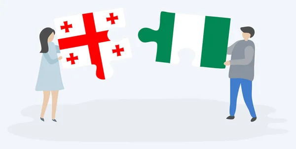 Pareja Sosteniendo Dos Piezas Rompecabezas Con Banderas Georgia Nigeria Georgia — Archivo Imágenes Vectoriales