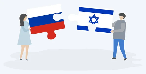 Dvojice Která Drží Dvě Skládanky Ruskými Izraelskými Vlajkami Ruské Izraelské — Stockový vektor