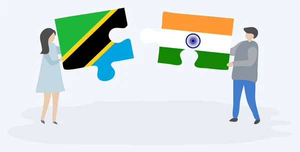 Pareja Sosteniendo Dos Piezas Rompecabezas Con Banderas Tanzania India Tanzania — Vector de stock