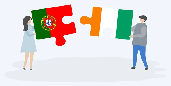 ポルトガルと象牙の旗を持つ2つのパズルのピースを保持しているカップル ポルトガルとコートジボワールの国のシンボル — ストックベクタ