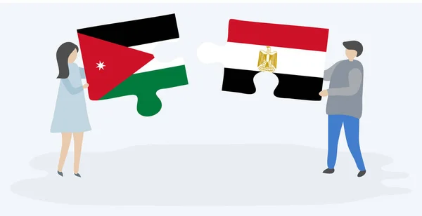 Pareja Sosteniendo Dos Piezas Rompecabezas Con Banderas Jordanas Egipcias Jordania — Archivo Imágenes Vectoriales