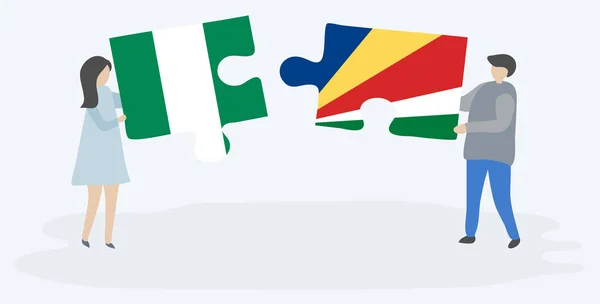 Ζευγάρι Που Κρατά Δύο Κομμάτια Παζλ Σημαίες Νιγηρίας Και Σεϋχελλών — Διανυσματικό Αρχείο