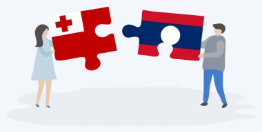 Çift Tongan ve Lao bayrakları ile iki bulmaca parçaları tutan. Tonga ve Laos ulusal sembolleri birlikte.
