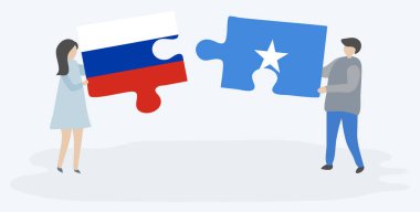 Rus ve Somali bayrakları ile iki bulmaca parçaları tutan çift. Rusya ve Somali ulusal sembolleri bir arada.